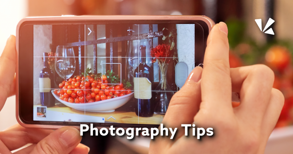 Photography tips blog header with image of person taking a photo with a smartphone