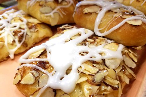 Raphael's Bakery donuts with icing and almonds