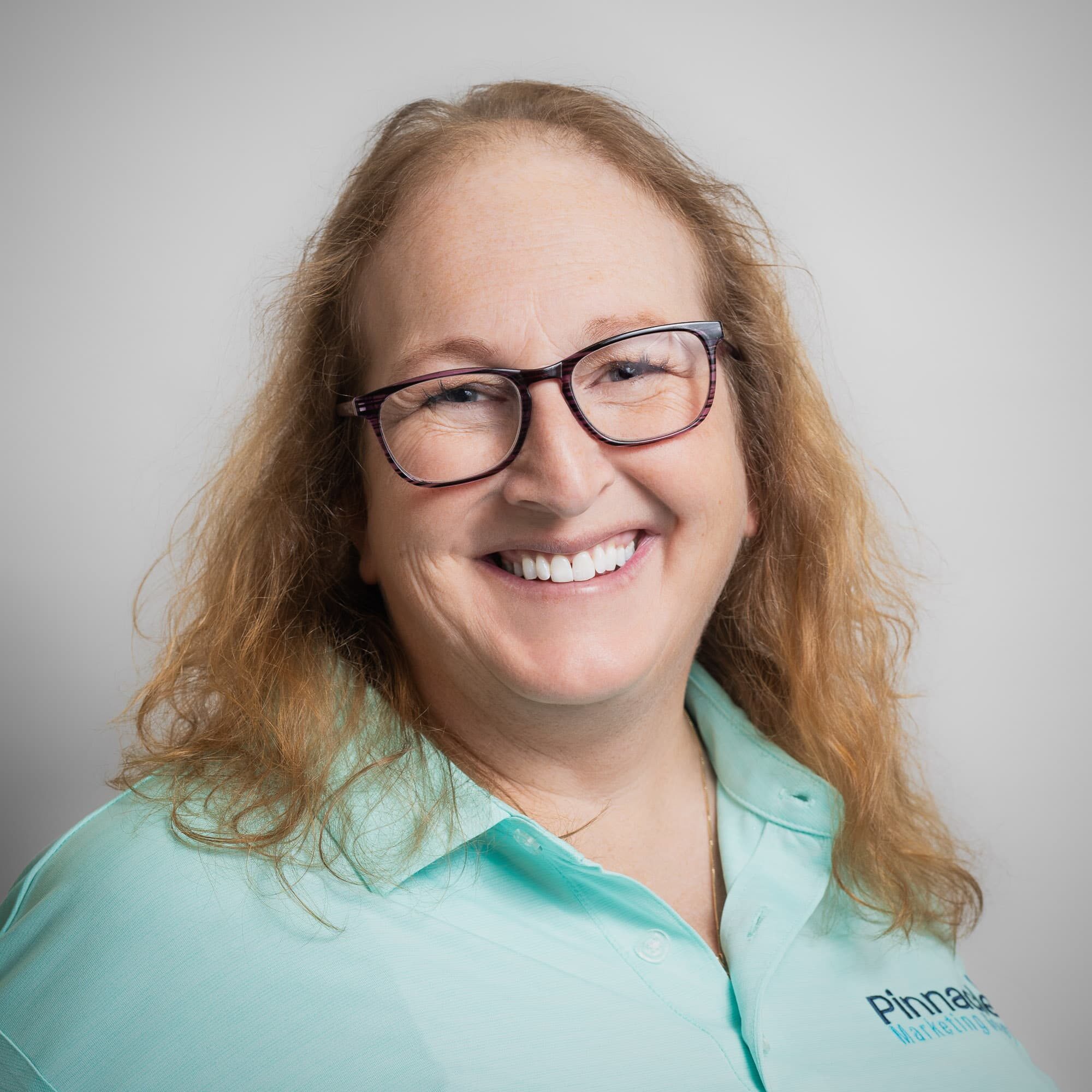 Head shot of Tami, Sales Representative at Pinnacle Marketing Group